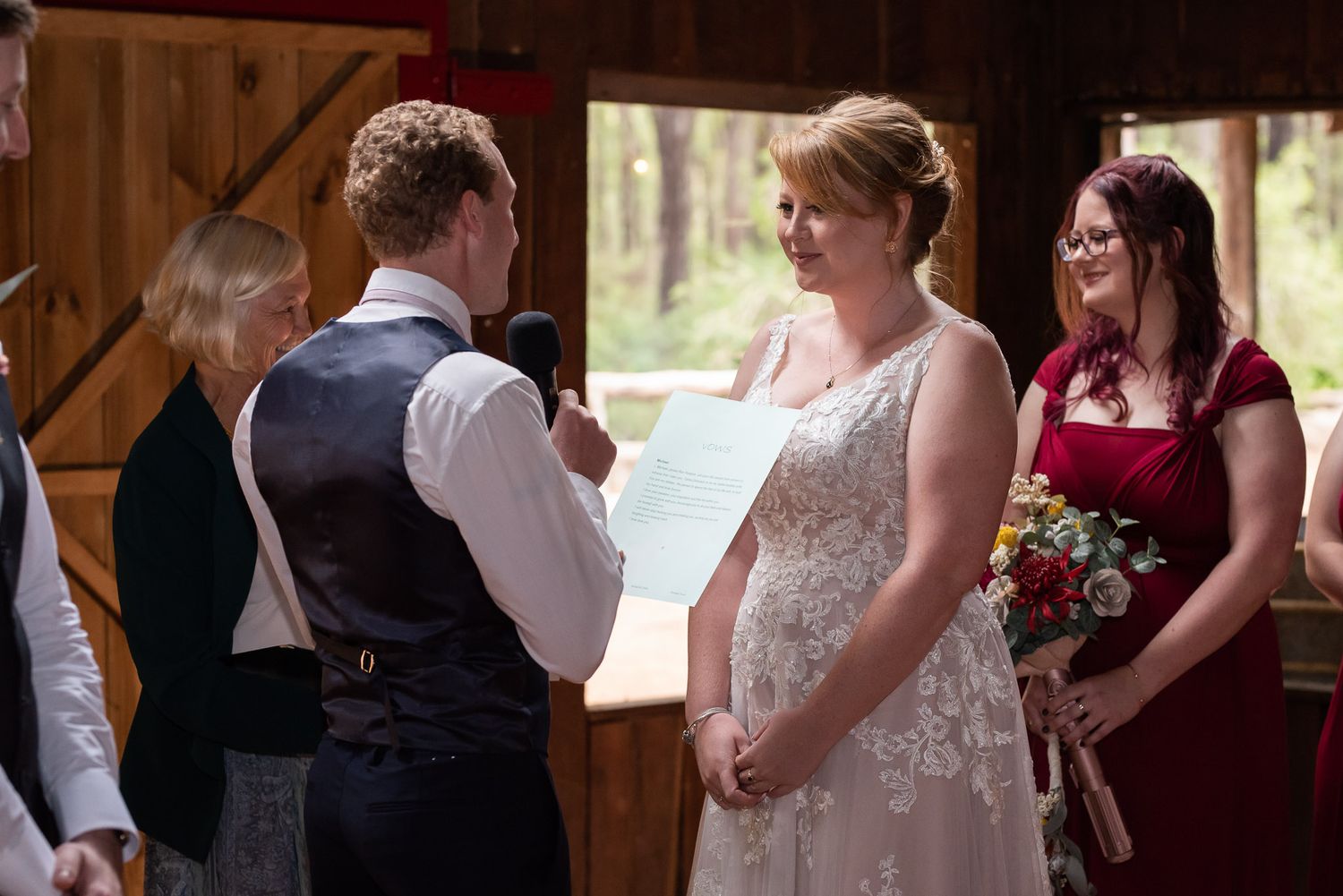 A series of romantic wedding moments showing couples dancing and embracing in a rustic wooden venue with natural lighting.