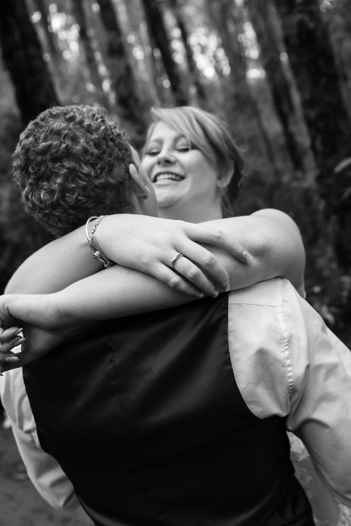 A black and white photo banner shows three progressive frames of a tender emotional embrace between two people.