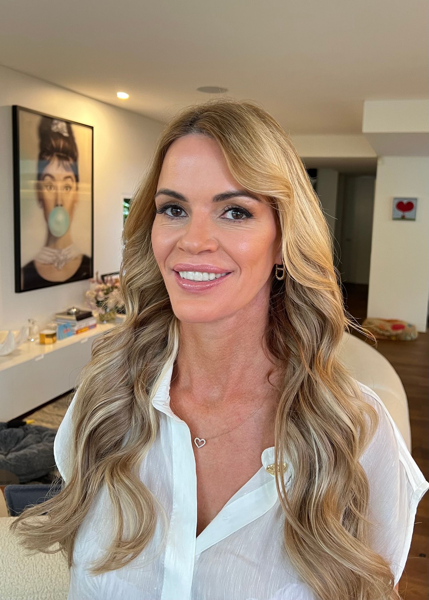 Portrait series showing person with blonde wavy hair wearing white button-down shirt.