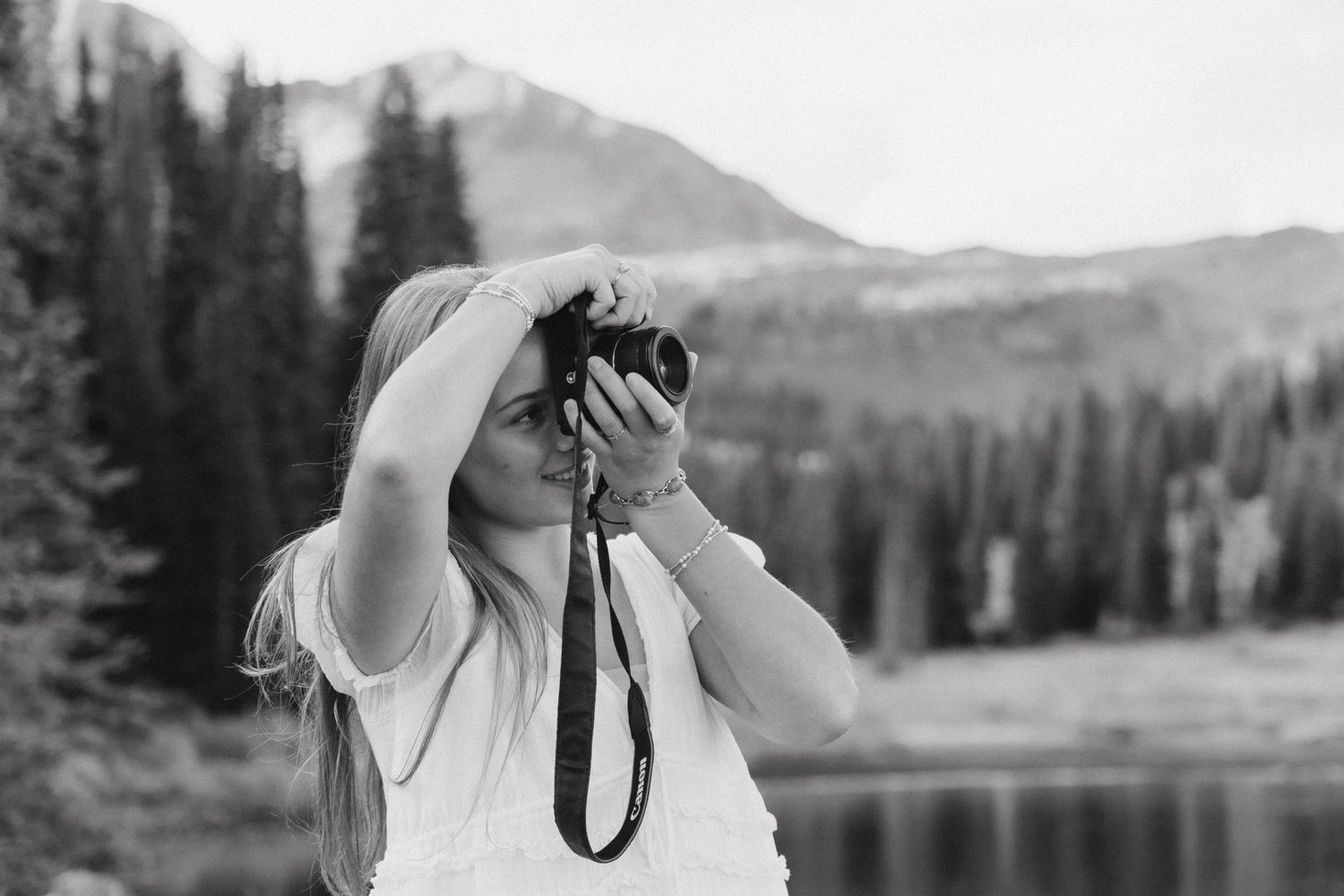 Black and white landscape photography series featuring mountain and lake views.