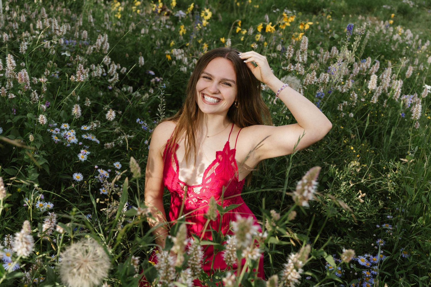 Family photography session in Crested Butte, Colorado senior session in wildflowers.