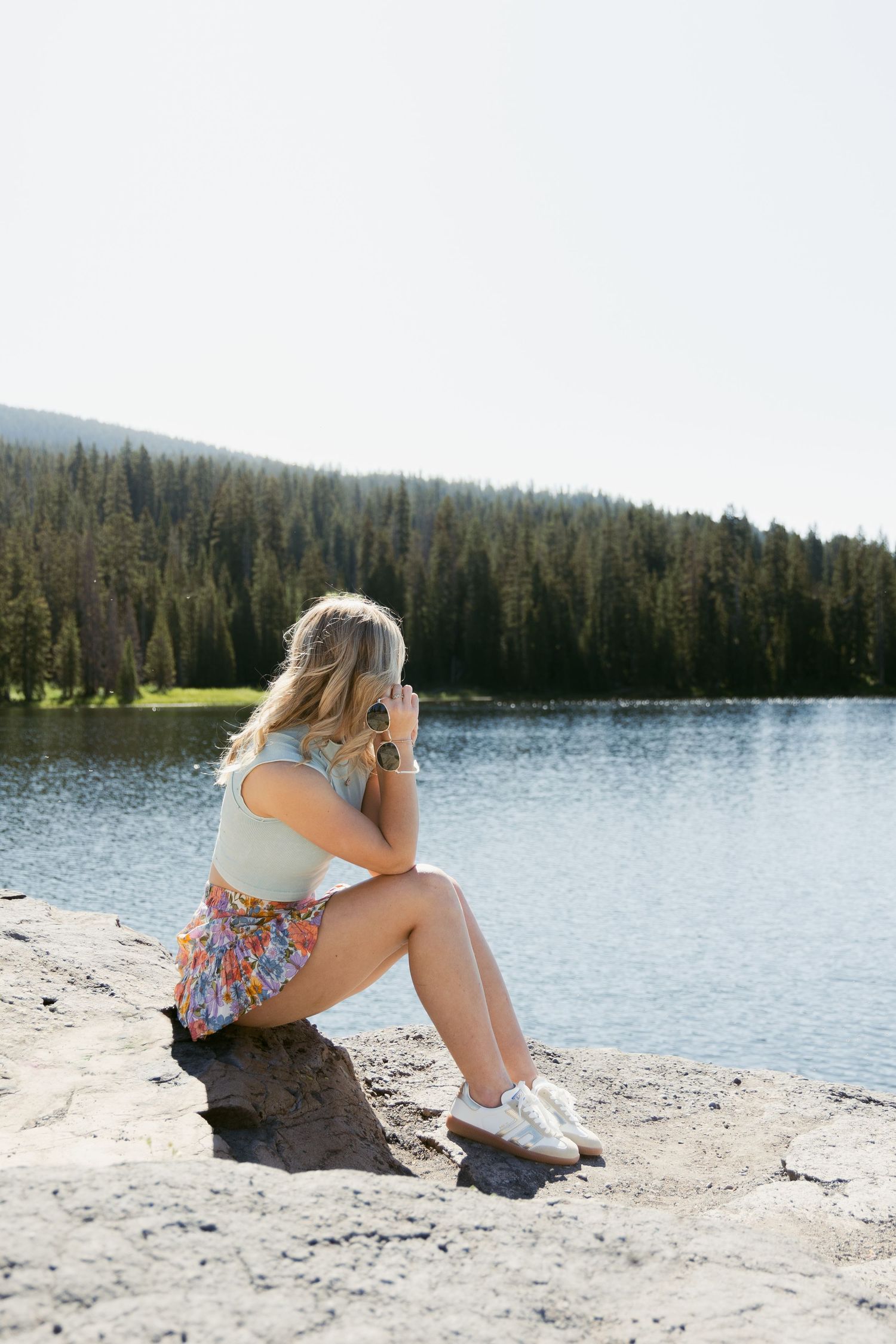 Senior photography session in Crested Butte, Colorado sitting by Lake Irwin.
