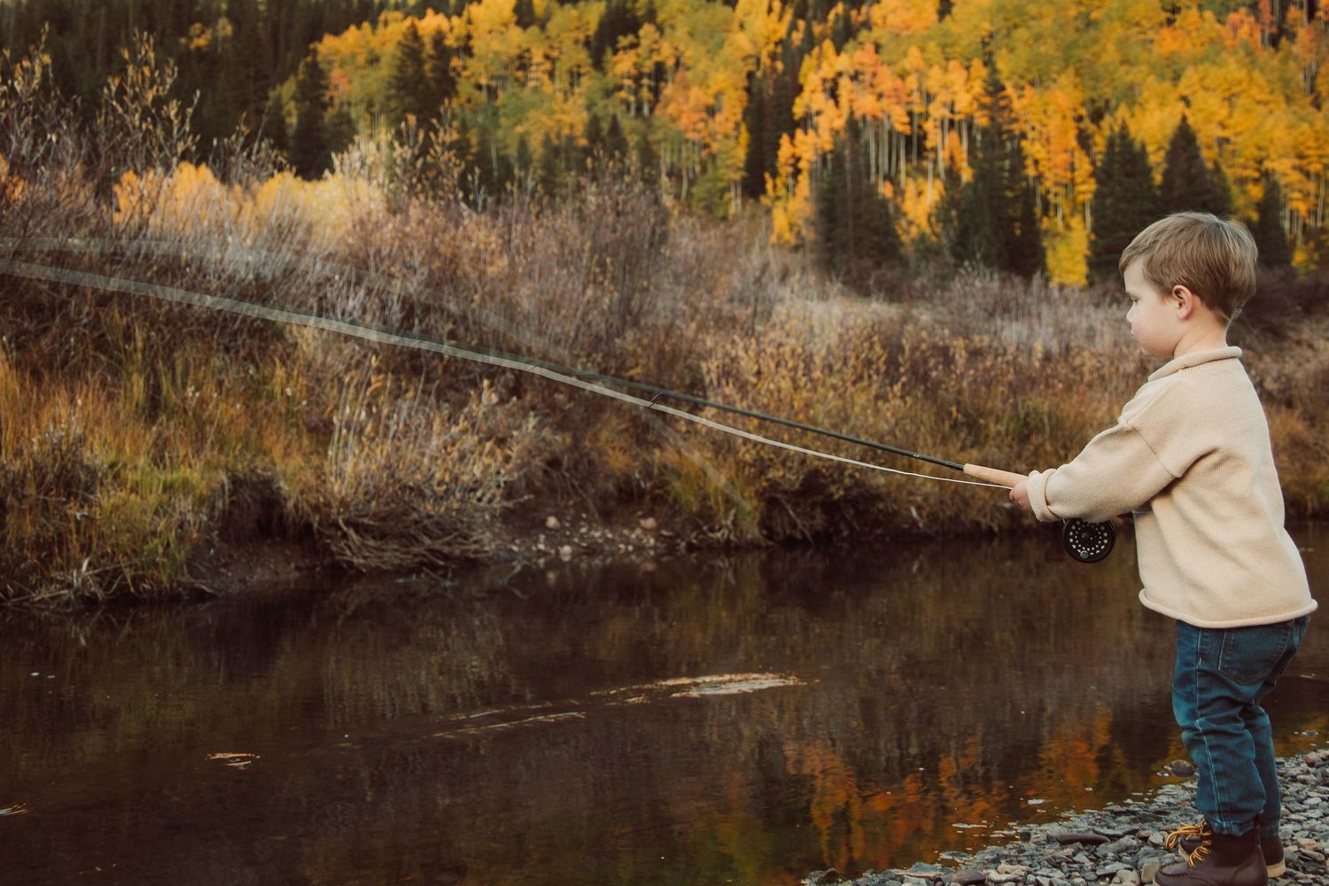 Family photography Crested Butte, Colorado fall colors, mountains, aspens river fishing