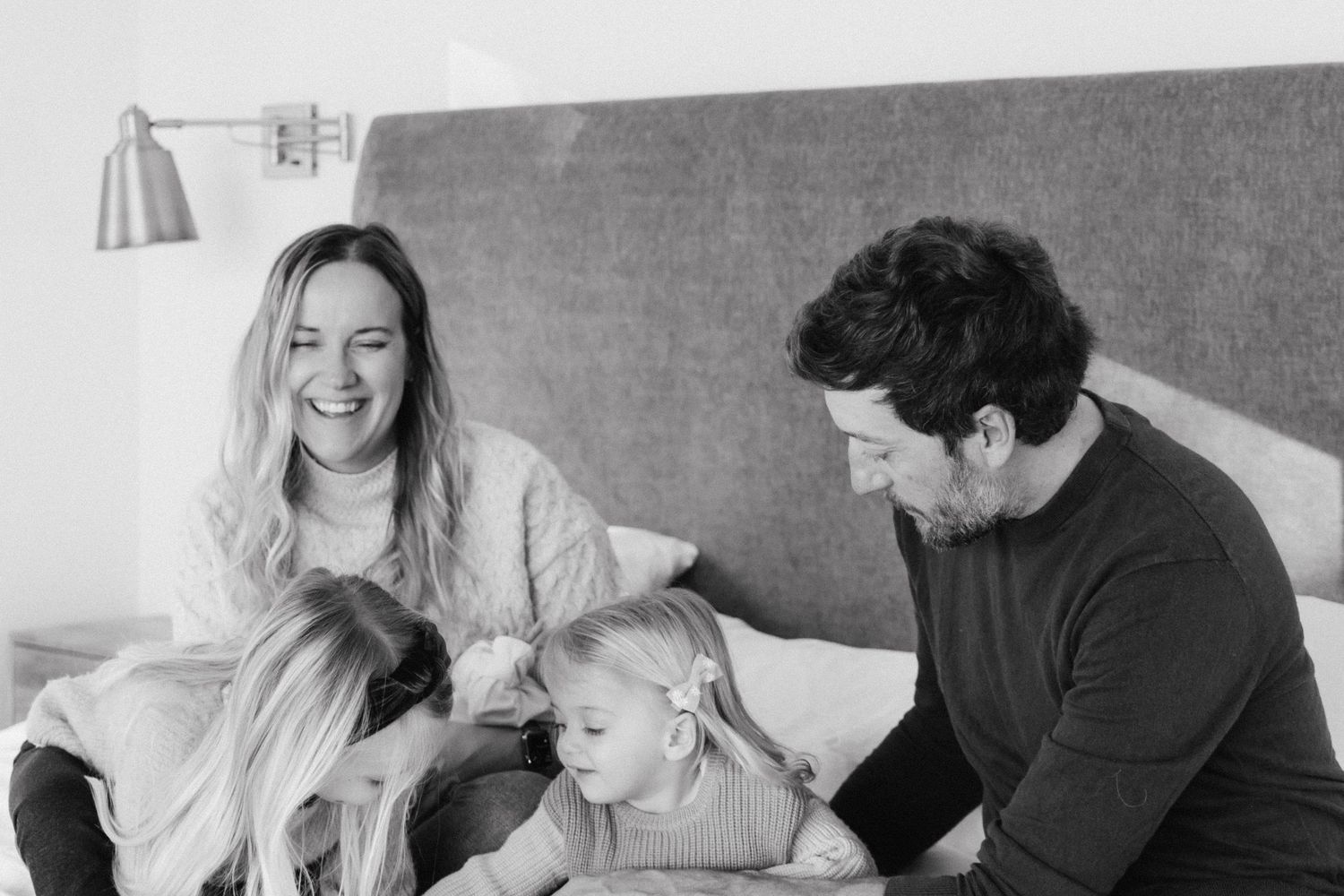At home newborn photography on bed. Crested Butte, Colorado