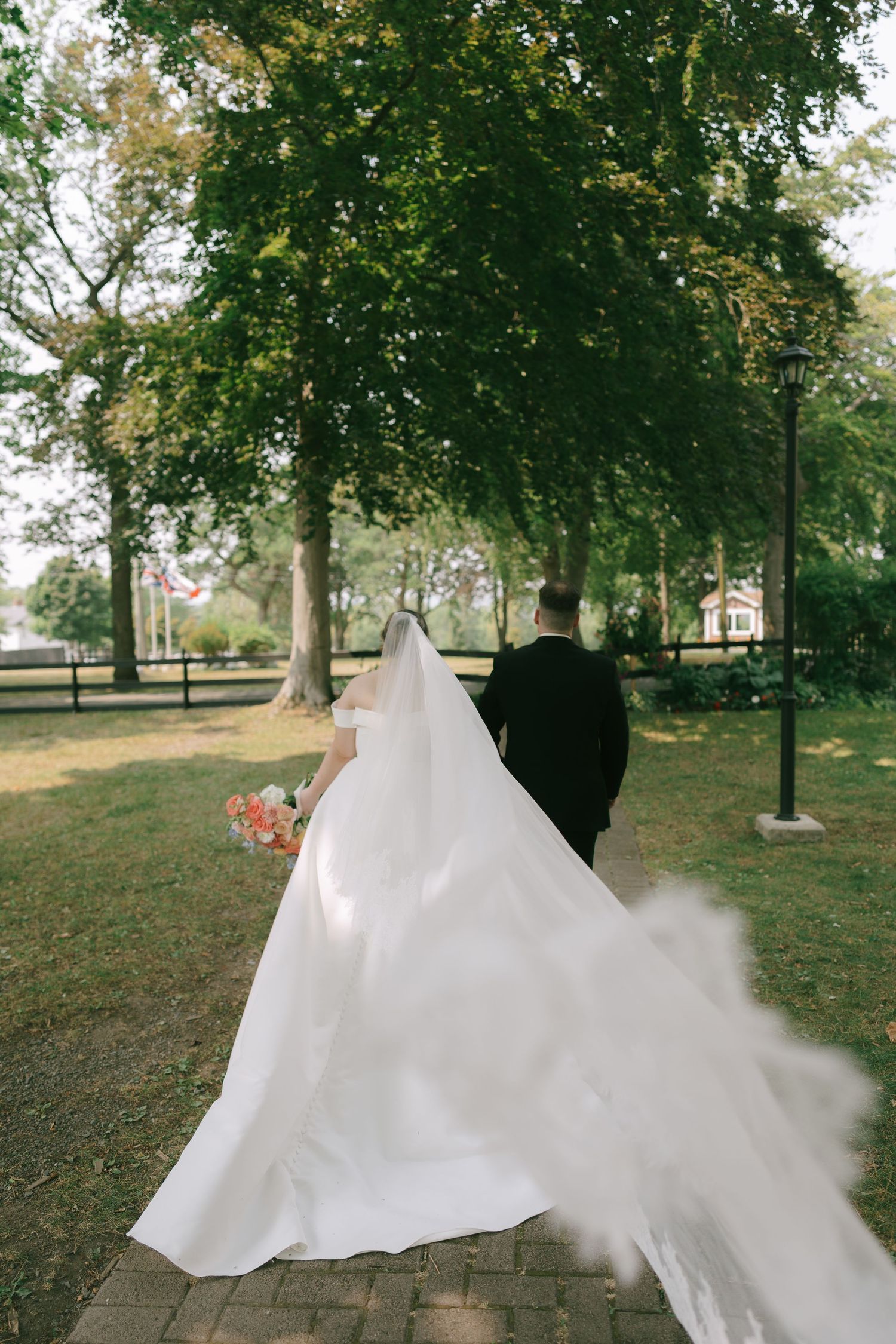 Wedding dress billows dramatically against green garden backdrop in artistic photo sequence.