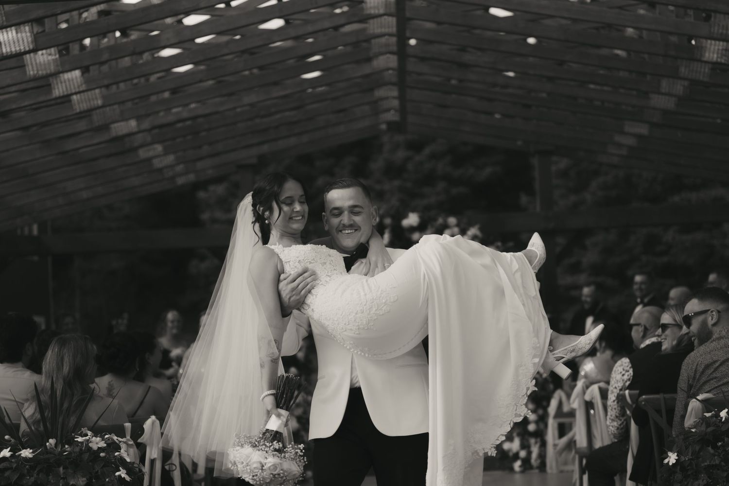 Black and white photo collage showing wedding reception moments with dancing and celebration on the dance floor.
