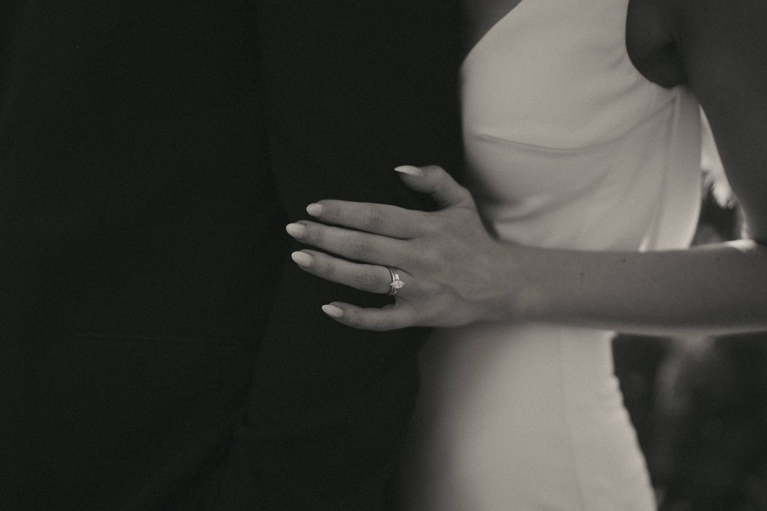 Artistic silhouette of dancing figures in soft lighting creates romantic atmosphere.