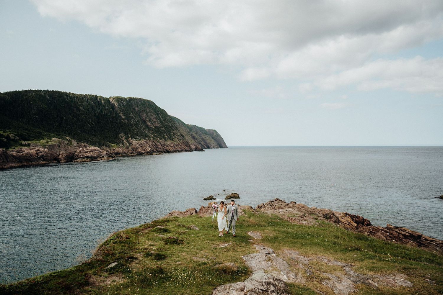 Dramatic coastal landscape with cliffs overlooking the ocean.