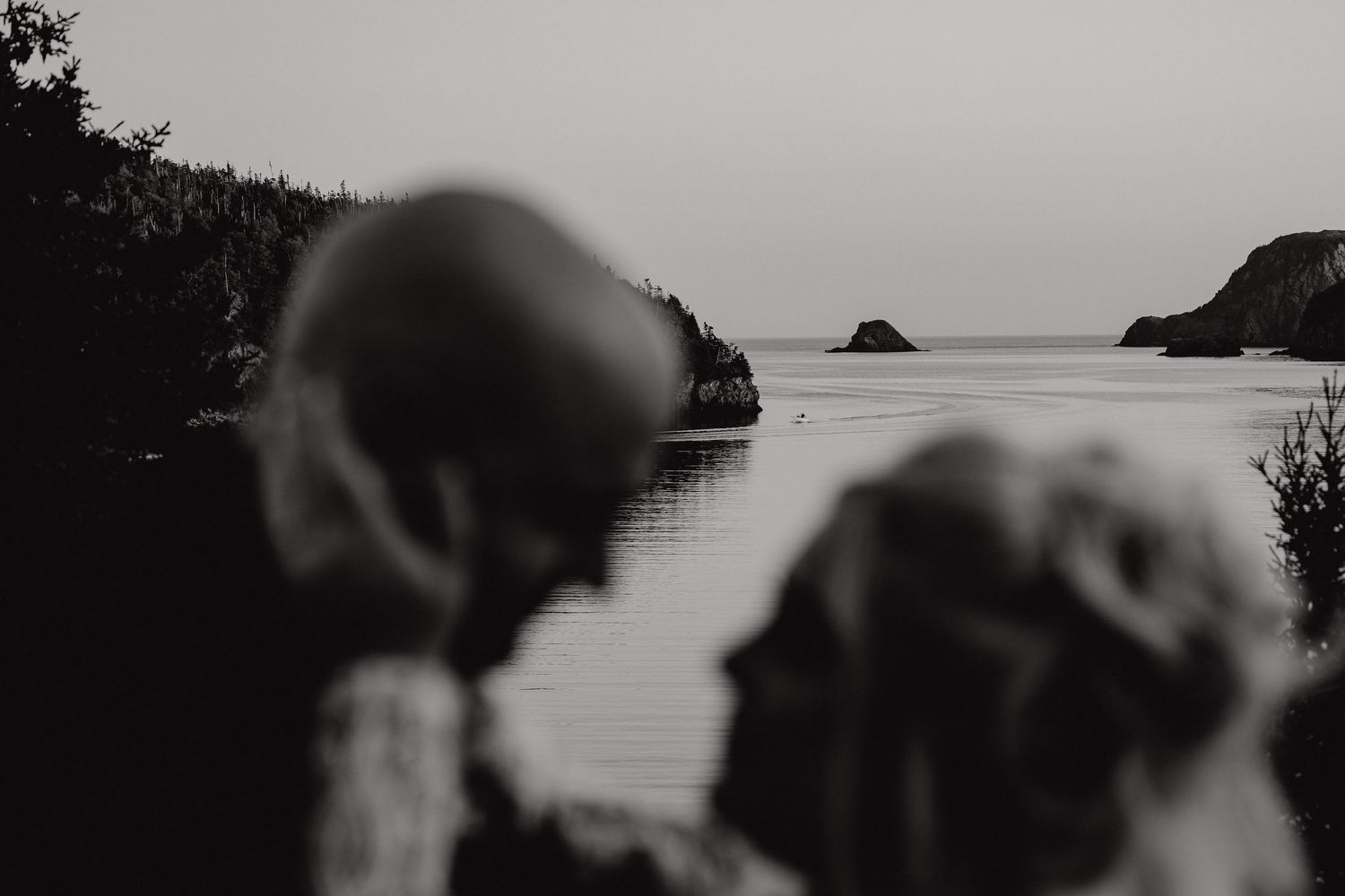 Series of dark silhouetted landscape photographs against a cloudy sky.