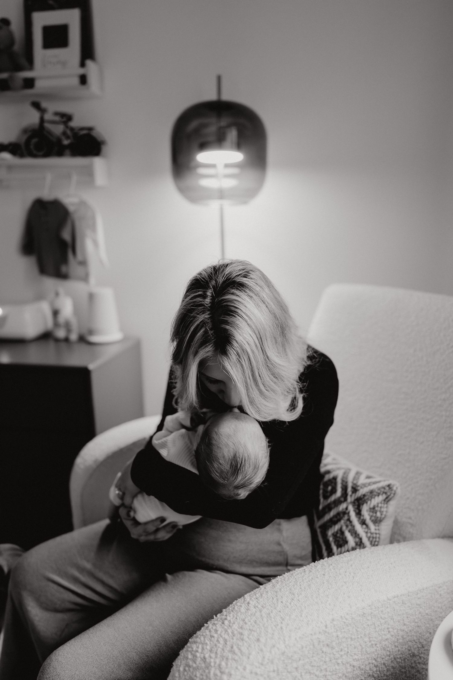 Black and white image showing quiet restful moment on a couch.