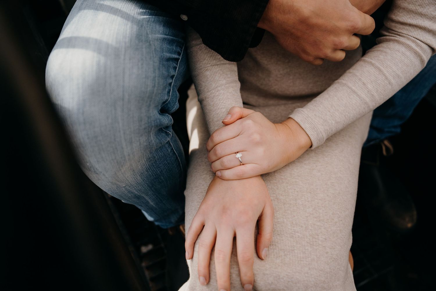 Close-up shots of couple's intimate embrace on rooftop stairs.
