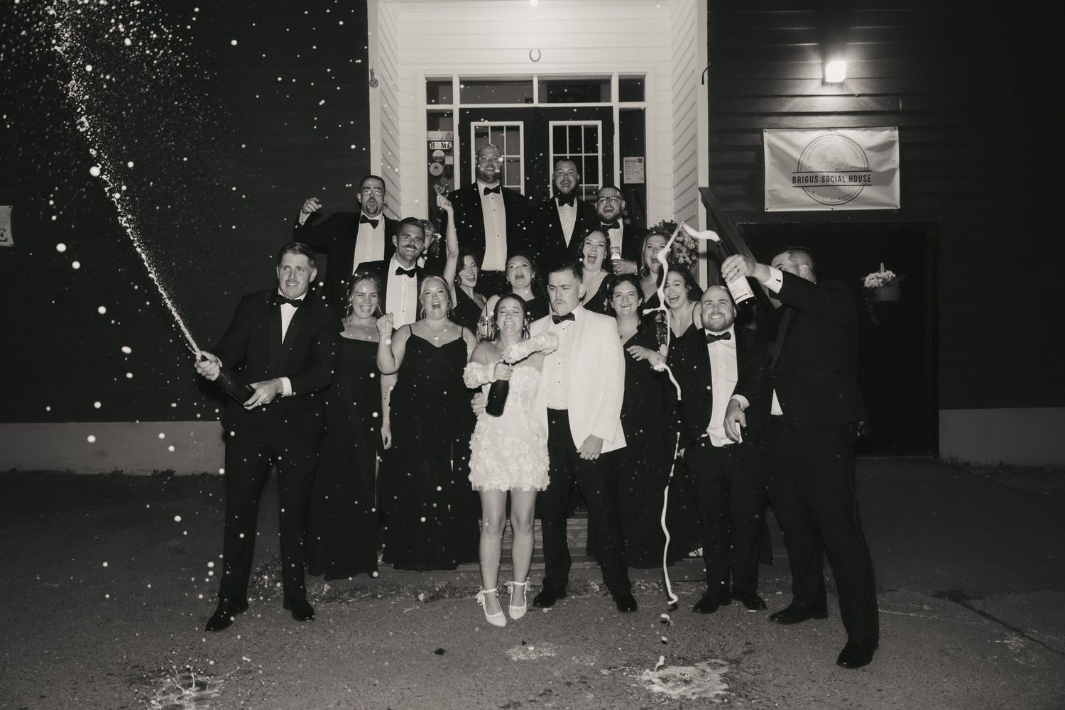 A series of black and white wedding celebration photos showing dancing, sparklers and reception festivities.