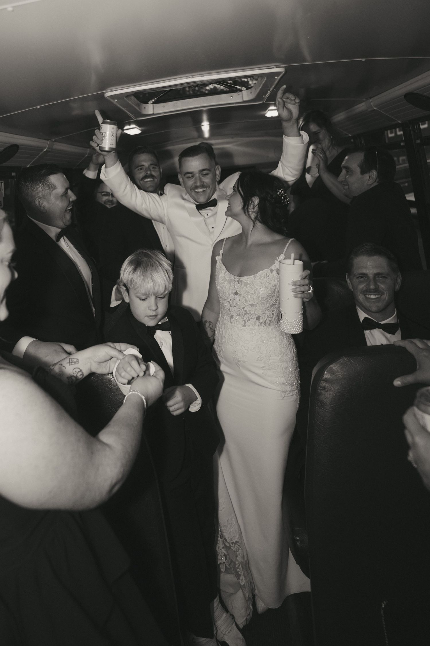 Black and white photos show people dancing and celebrating at what appears to be a lively wedding reception.