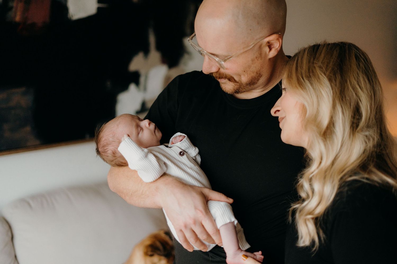 Lifestyle photography session showing gentle family interactions in warm natural light.