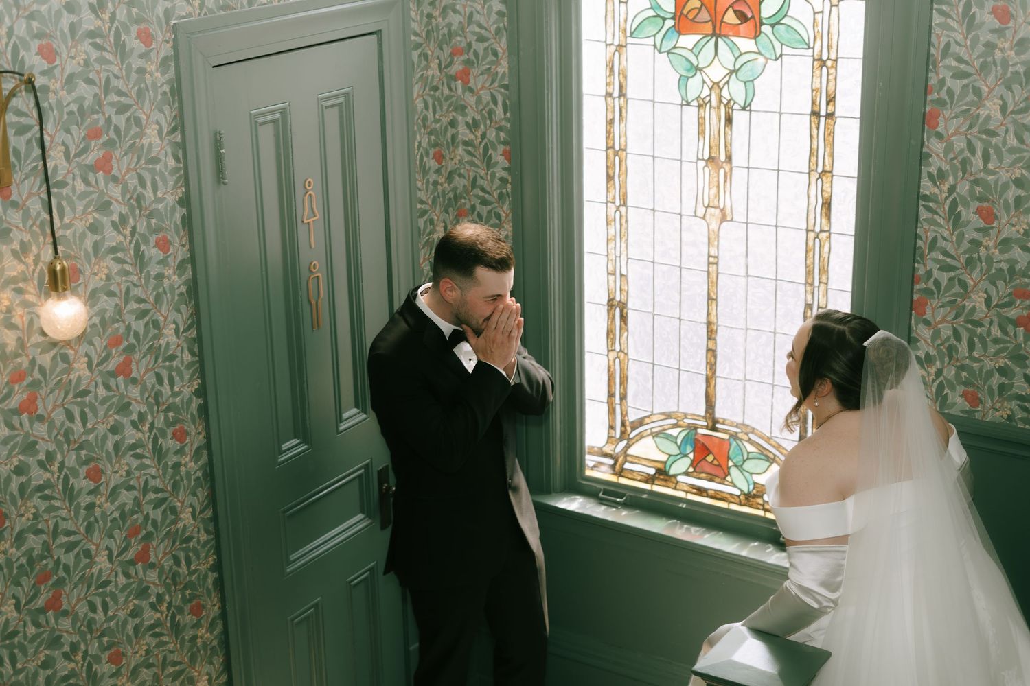Intimate stained glass window scene in vintage room.