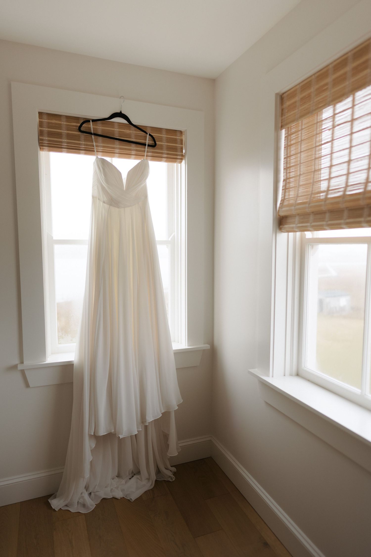 A series of five interior window views with white curtains and bamboo shades creating a bright, minimalist aesthetic.