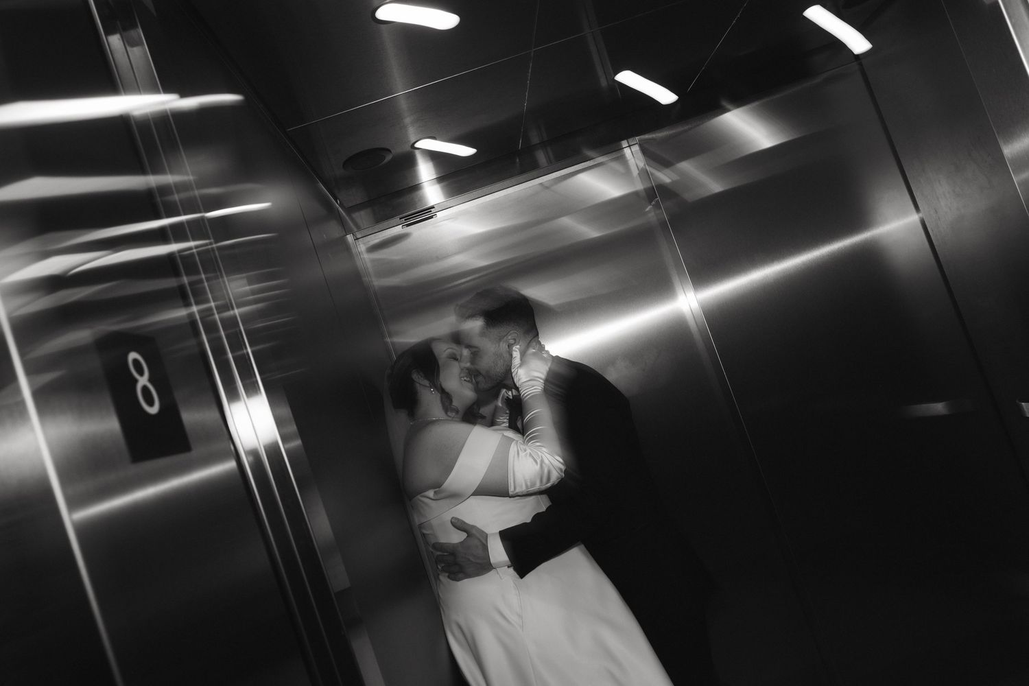 Contemporary wedding photography sequence showing dramatic poses in an elevator interior.