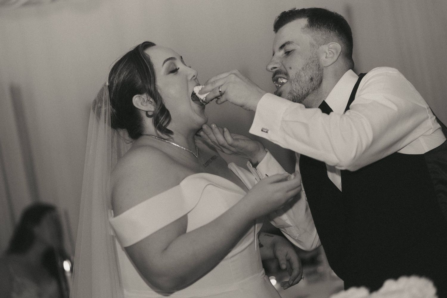 Black and white photo series shows couple sharing intimate dance moves at their wedding.