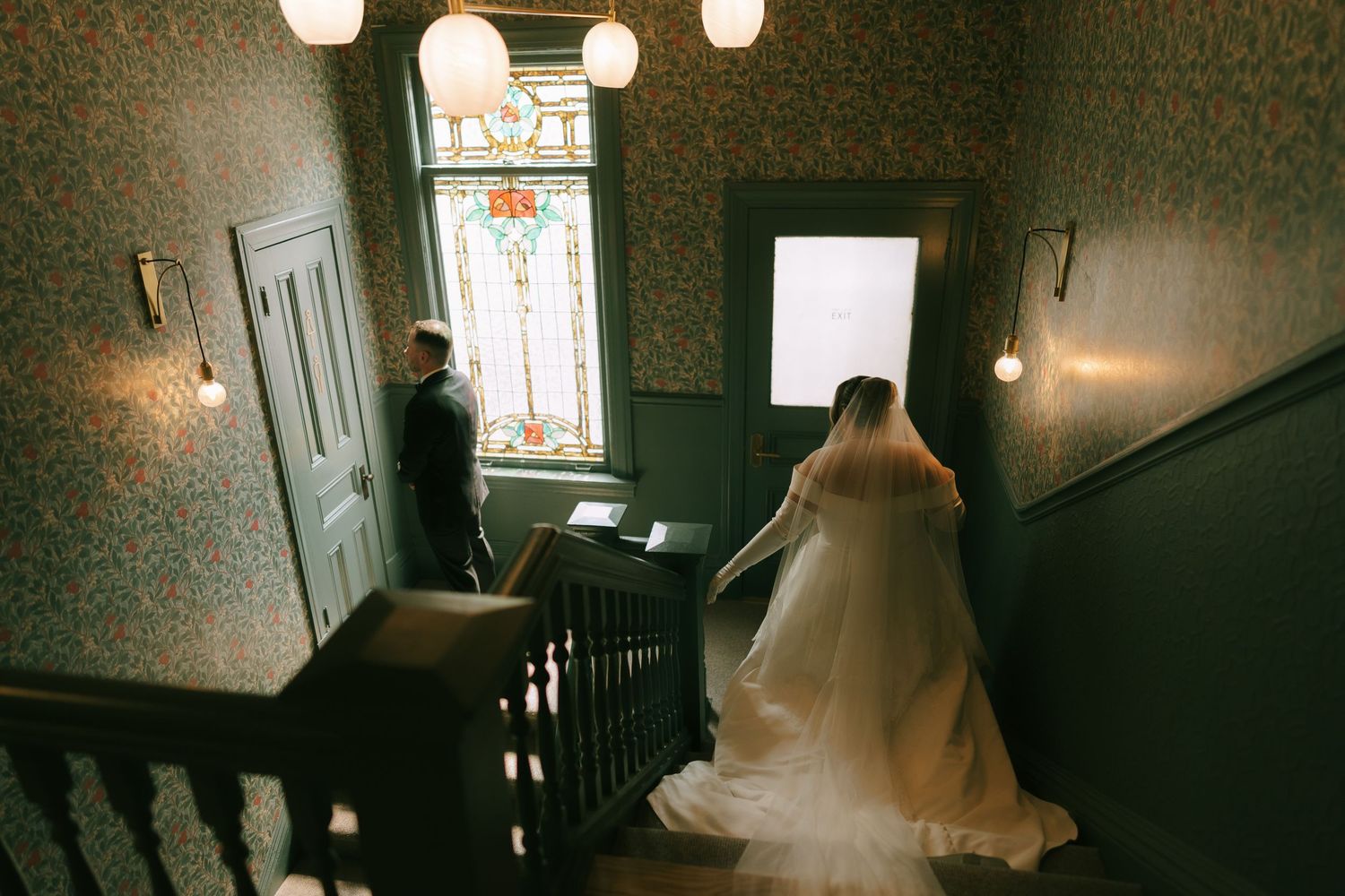 Moody interior shots of vintage room with stained glass windows.