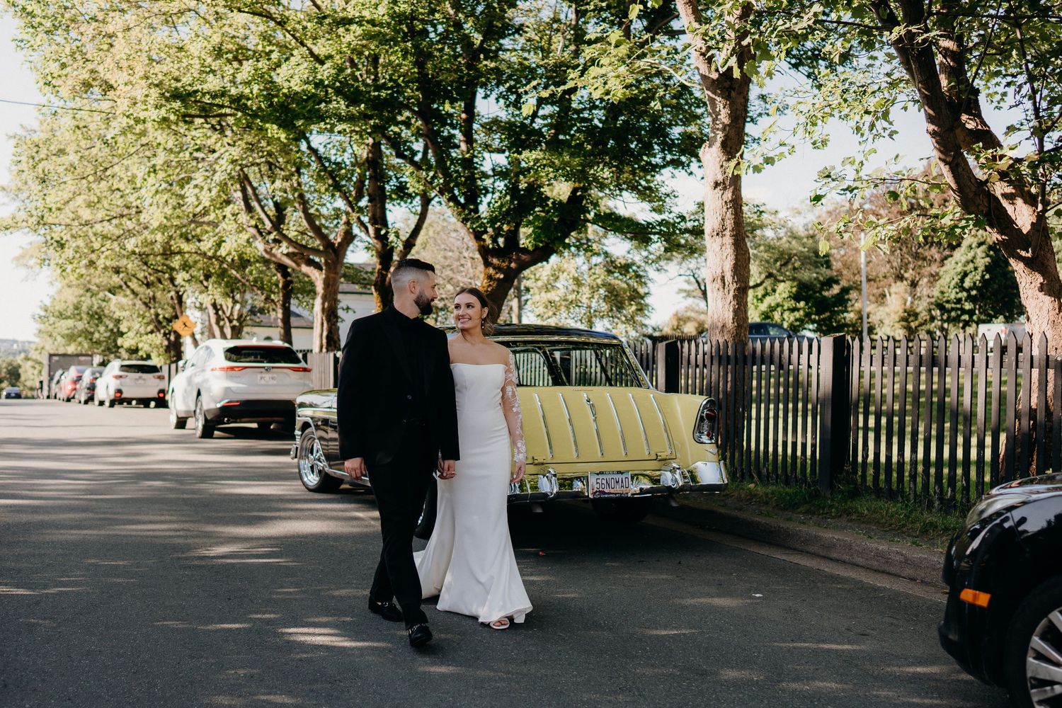 Wedding photography sequence showing couple walking through sunny garden path.