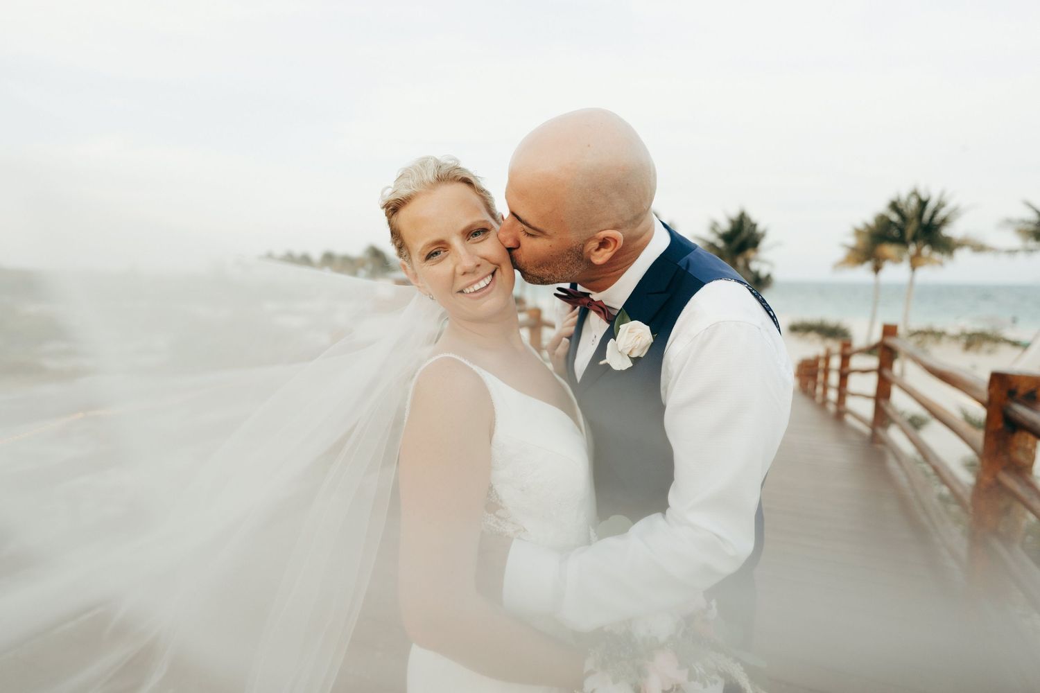 Light and airy wedding photography showcasing a romantic coastal celebration.