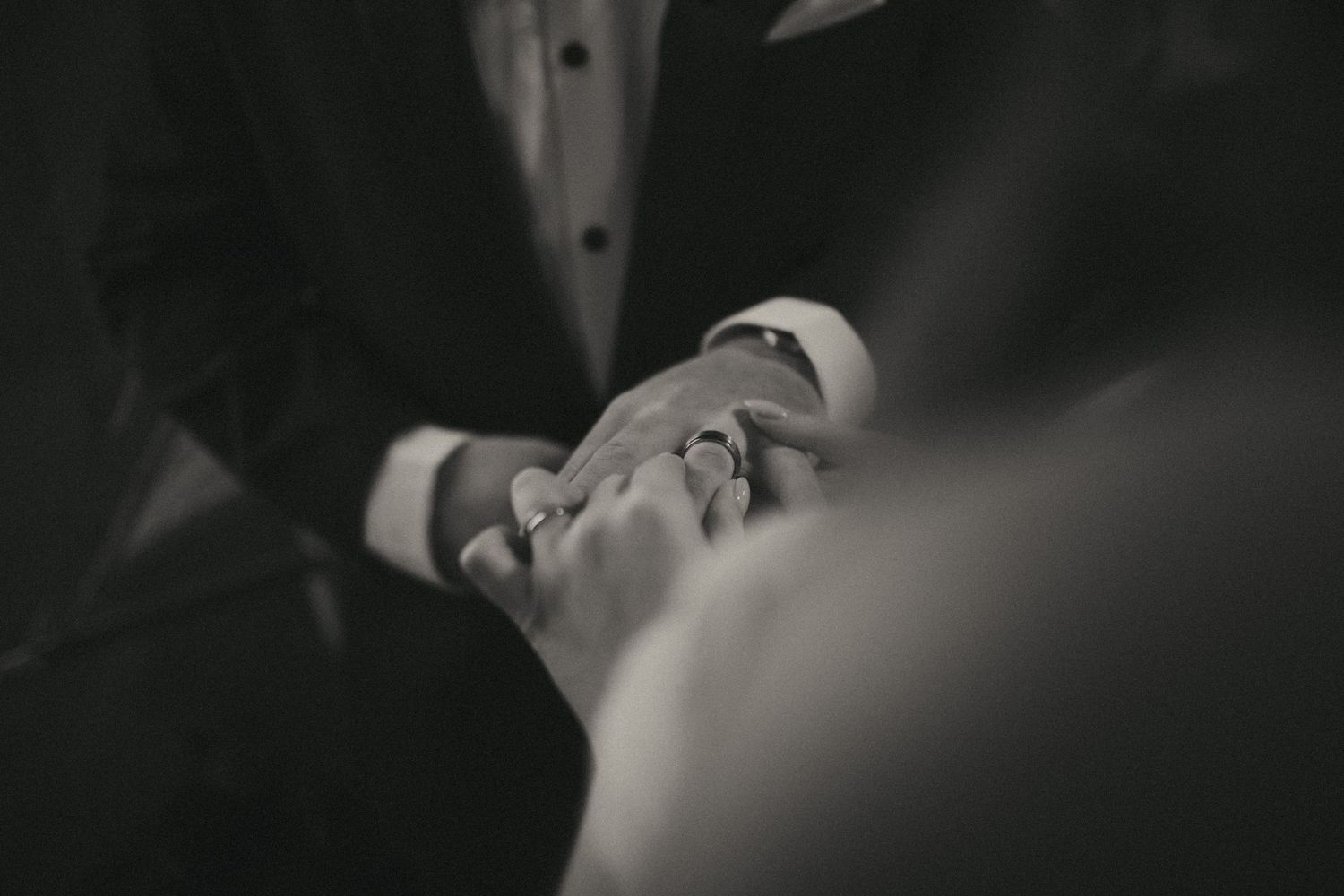 Artistic black and white close-up wedding photography sequence.