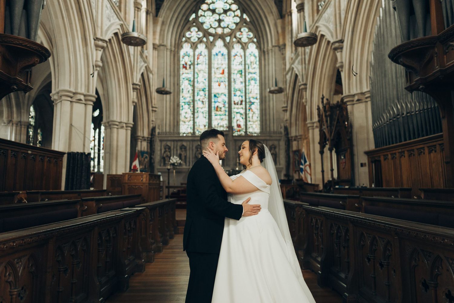 Elegant cathedral wedding shoot with dramatic architectural features and natural light.