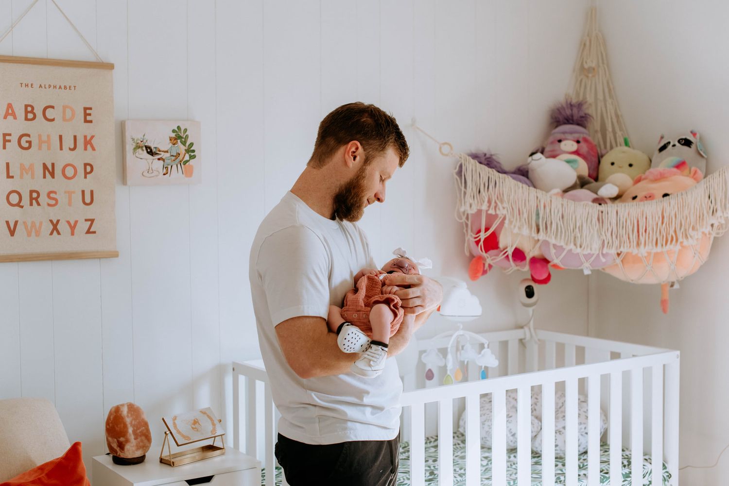 Newborn portraits in Wheeling WV by Miranda Nicole Photo + Video, capturing tender moments and natural connection with gentle care.