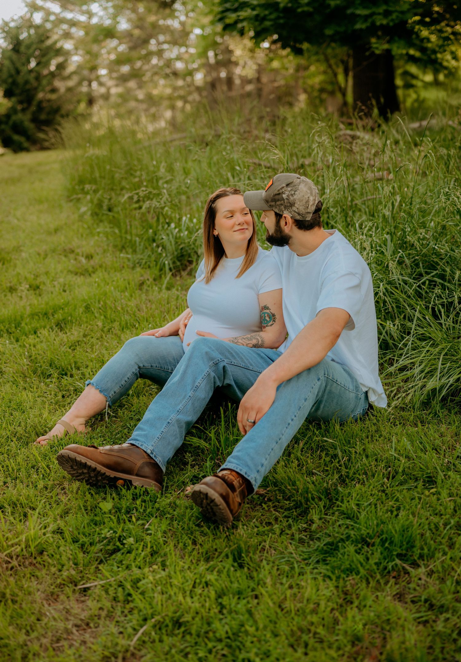 Outdoor maternity photos in Wheeling WV by Miranda Nicole Photo + Video, capturing glowing, natural moments in beautiful scenic light.