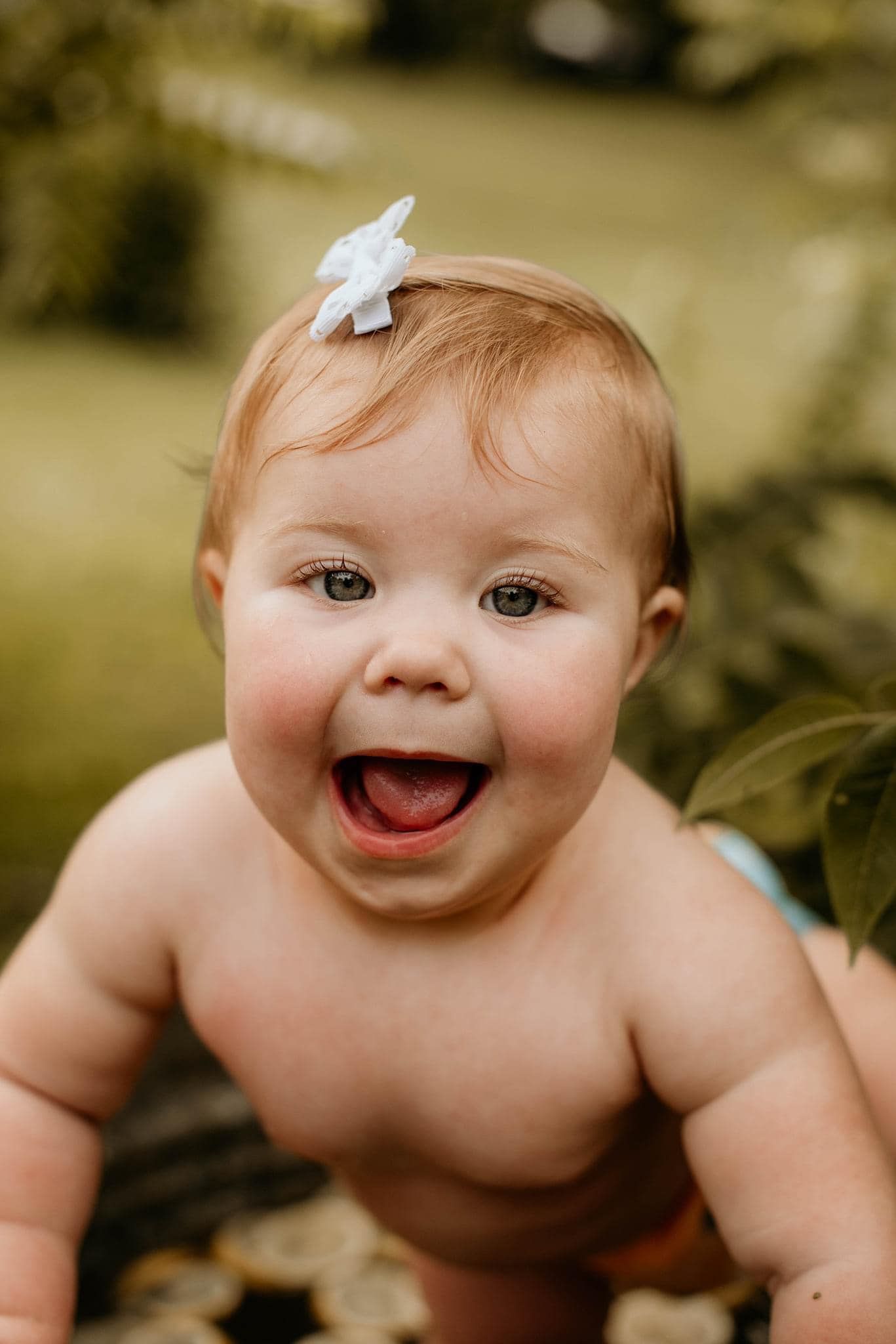 Seasonal children’s photography in Wheeling WV by Miranda Nicole Photo + Video, capturing playful, natural moments in outdoor settings.