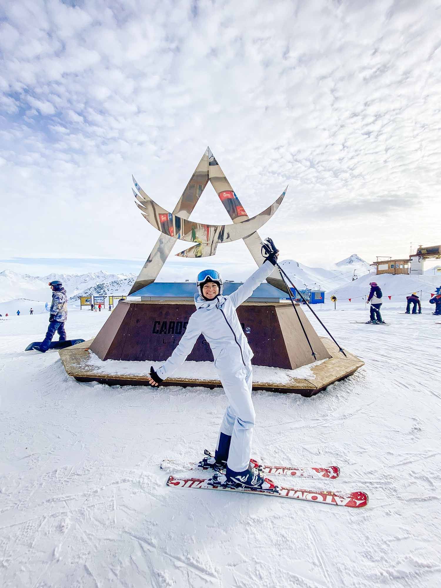 A series of snowy winter scenes showing teepee-style tents and ski equipment on a bright white mountain landscape.