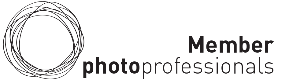 Professional photographer logo design featuring concentric circles and stylized text on white background.