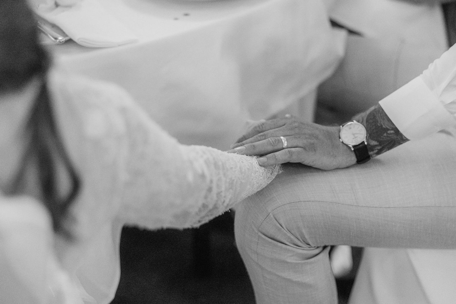Medical professional in protective gloves carefully handles a syringe during a healthcare procedure.