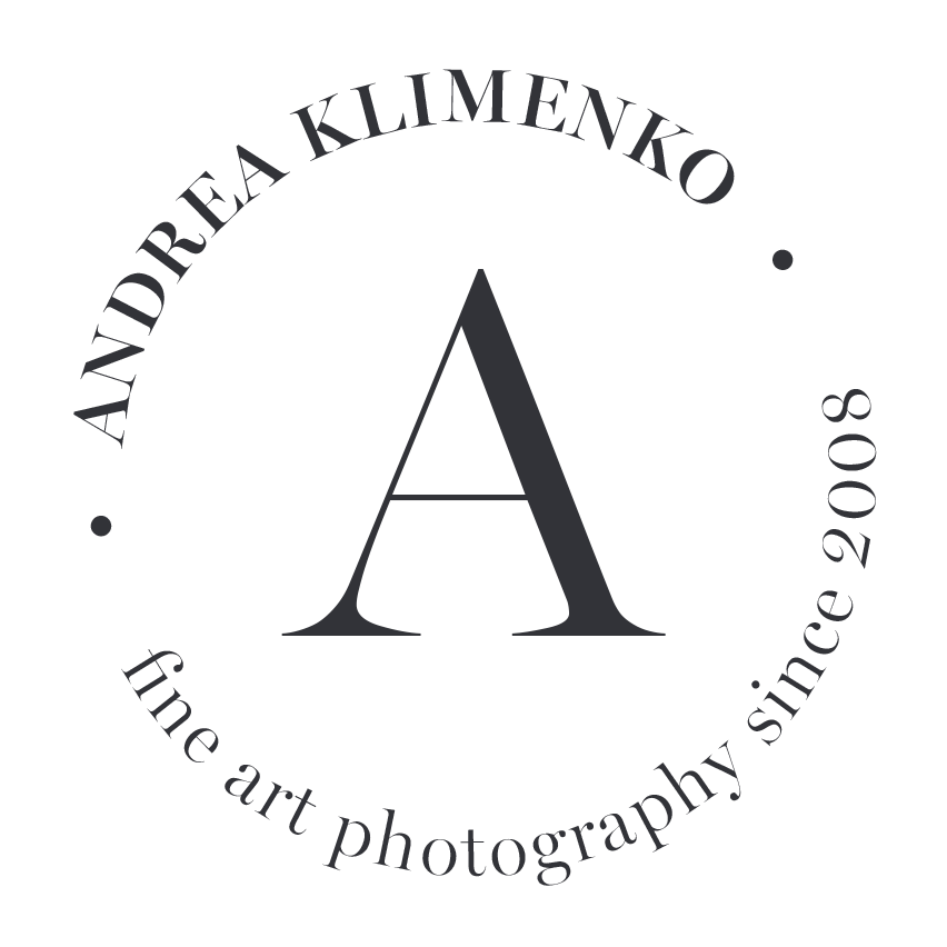 Circular text logo design with artistic typography arranged in a curved pattern around the edges.