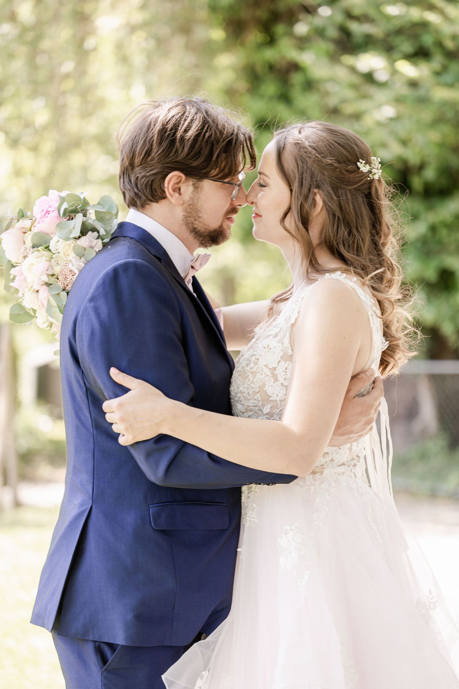 A romantic wedding collage showing tender moments between a couple in a navy suit and white dress outdoors.