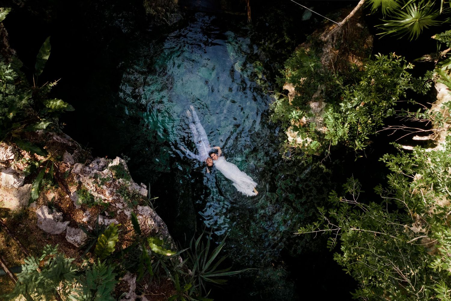riviera Maya wedding at a cenote, couple trash the dress -riviera Maya wedding photographer and filmmaker