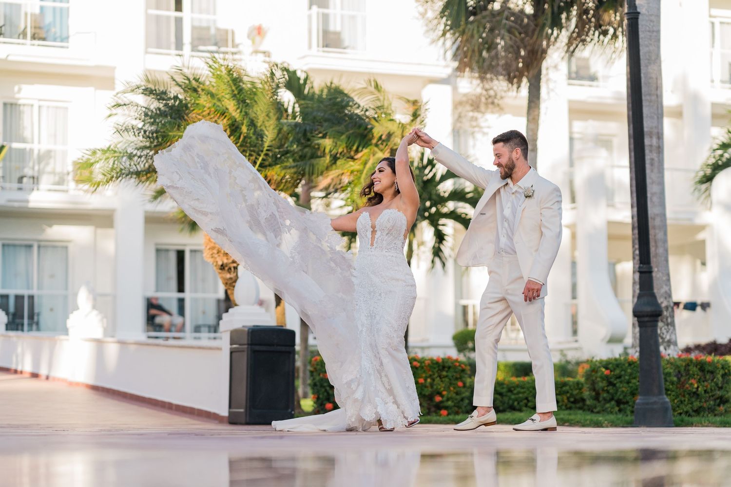 cancun wedding  photographer and filmmaker - bride and groom dancing in portrait session