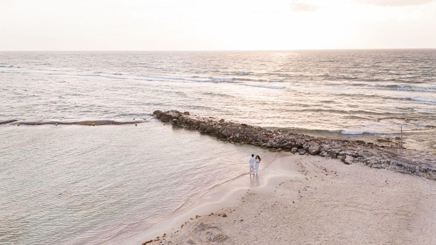 cancun marriage proposal photoshoot, drone photo on sunrise at the beach.