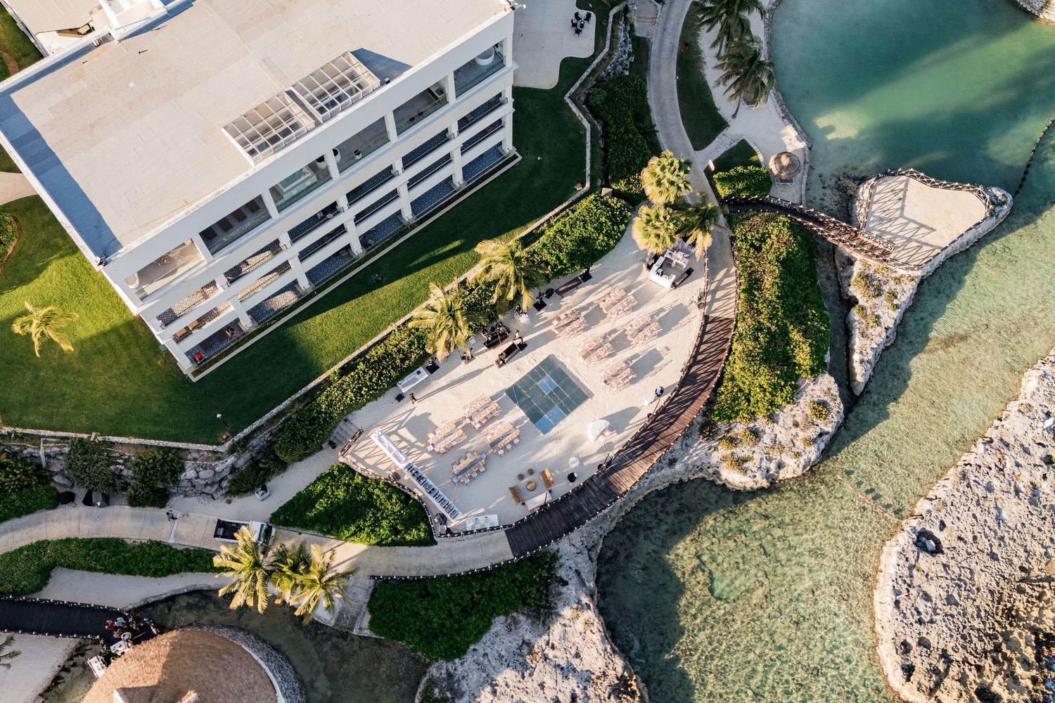 Aerial view of a modern beachfront wedding reception at Hard Rock Riviera Maya