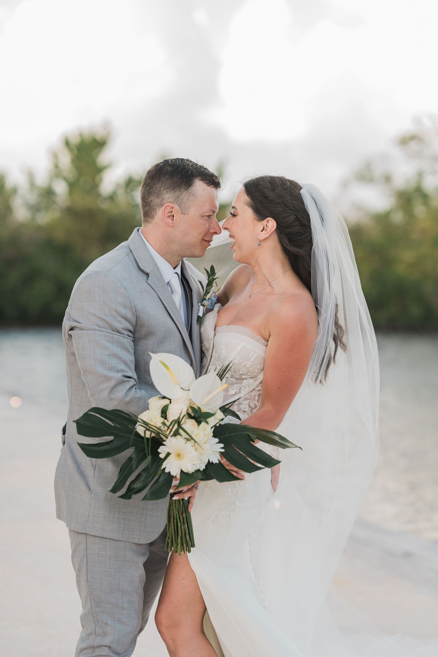 Bride and groom share a romantic moment at grand palladium costa mujeres wedding