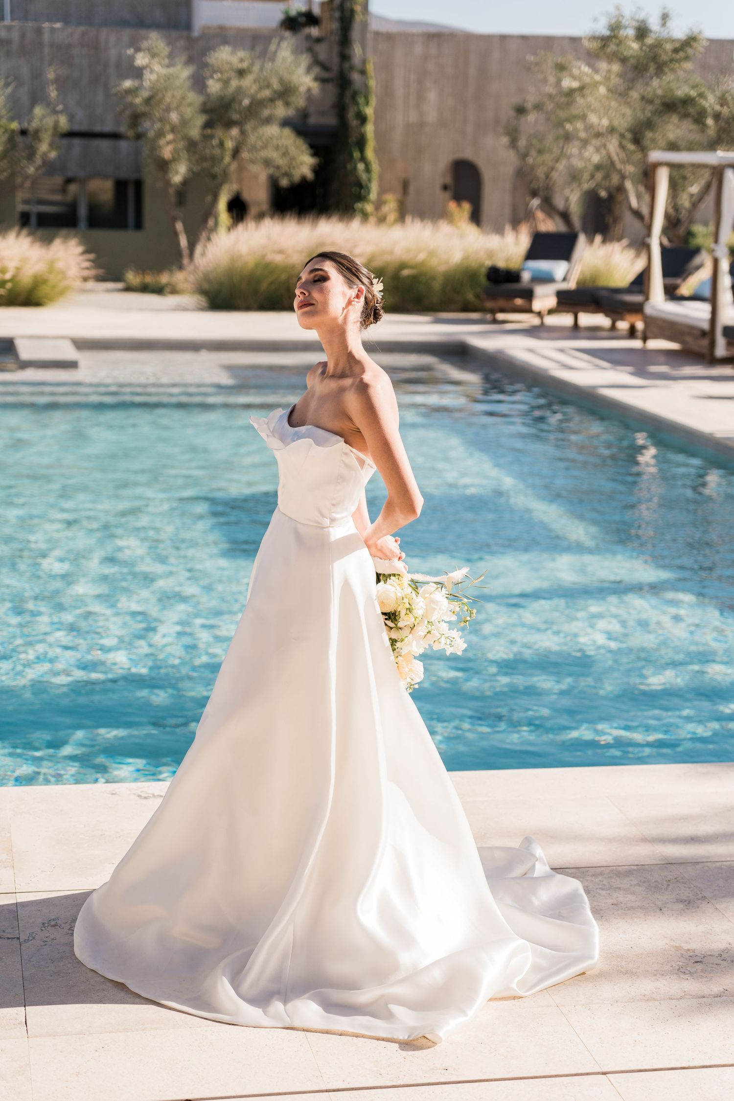 Cabo wedding bride portrait by the pool