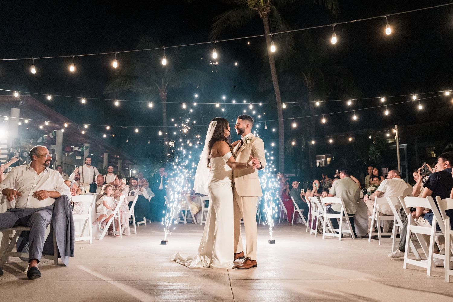 Mexico destination wedding photographer and Filmmaker - couple first dance with sparklers