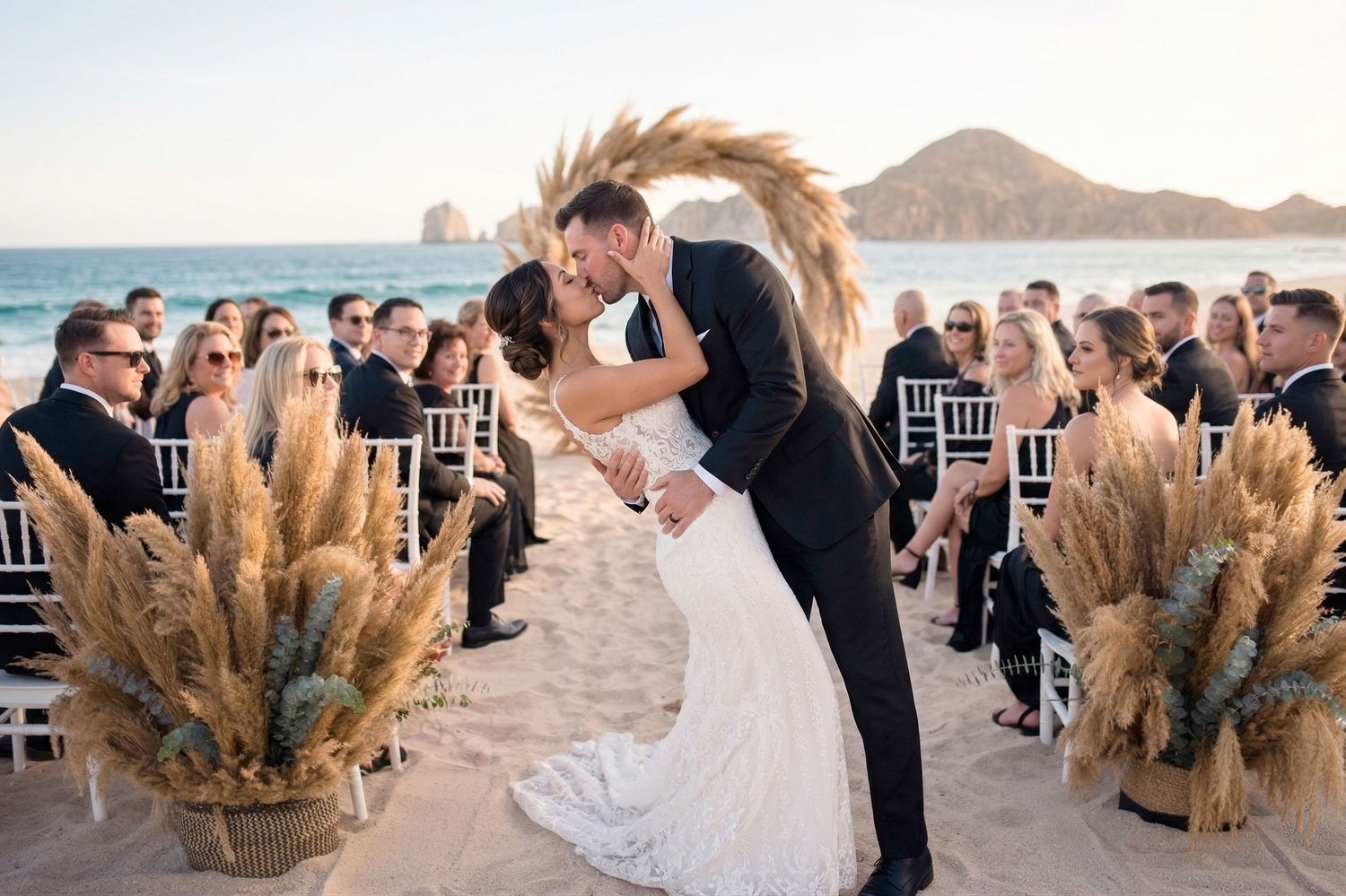 Ceremony first kiss photographed ny Luis Tovilla, a cabo wedding photographer & filmmaker