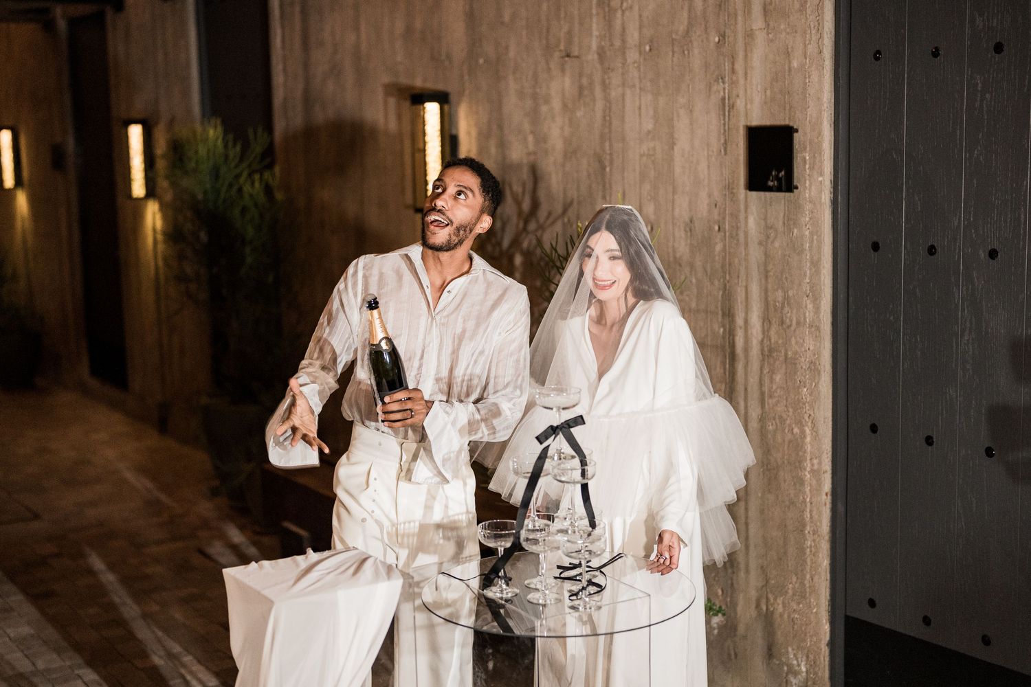 Bride and groom champagne opening Valle de Guadalupe Mexico destination wedding