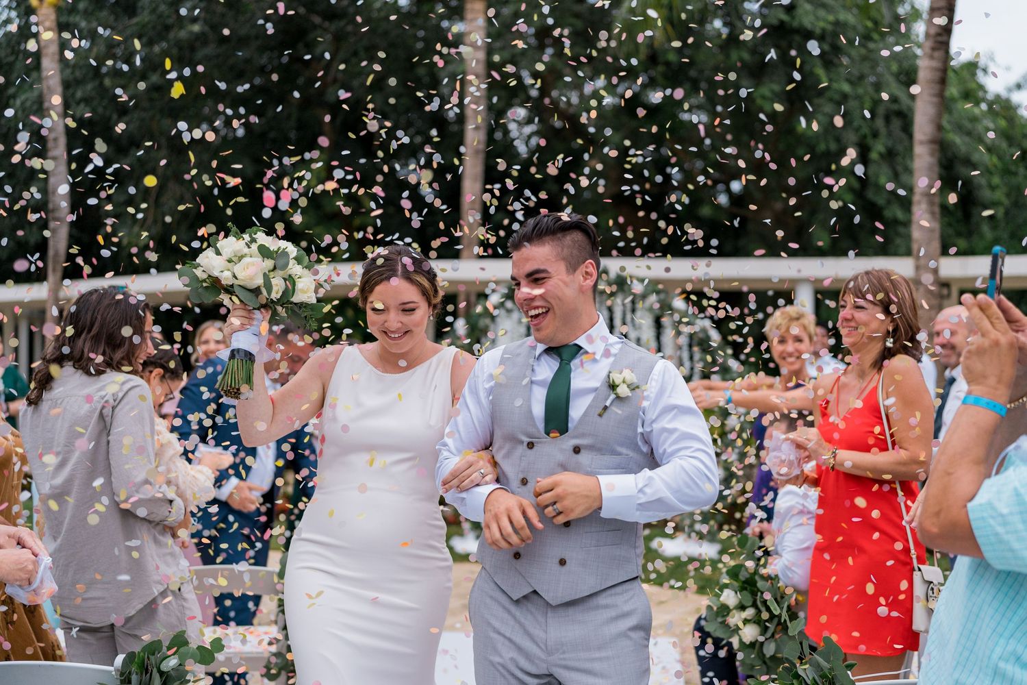 cancun wedding  photographer and filmmaker - ceremony exit confetti