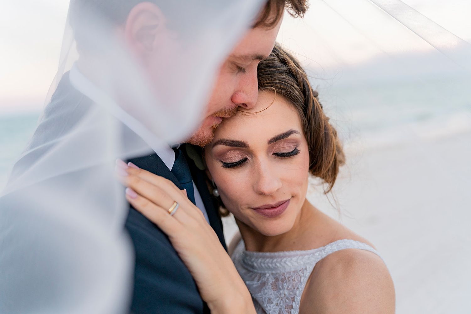Couple hugging at cabo wedding