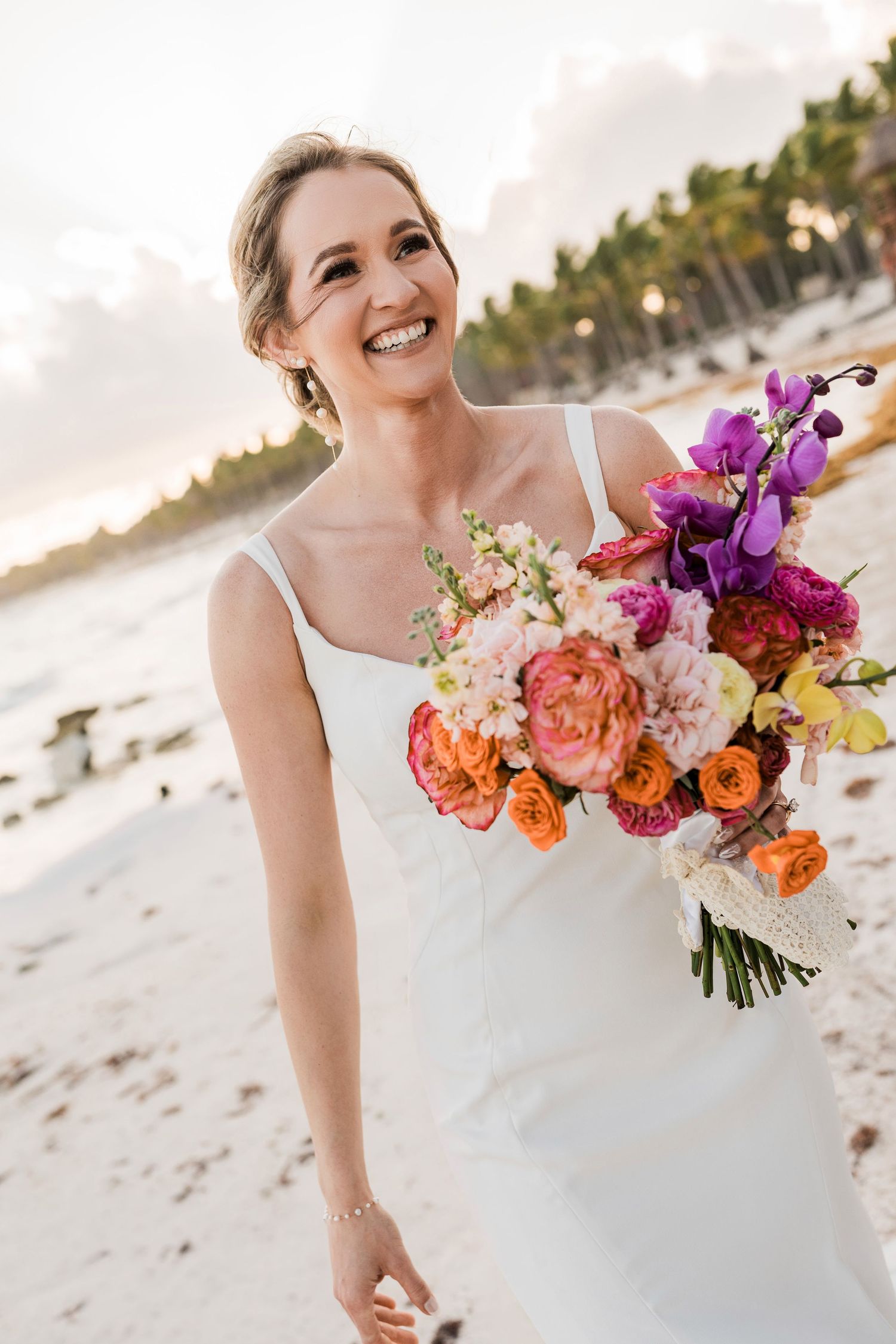 cancun wedding  photographer and filmmaker - bride walking at her wedding