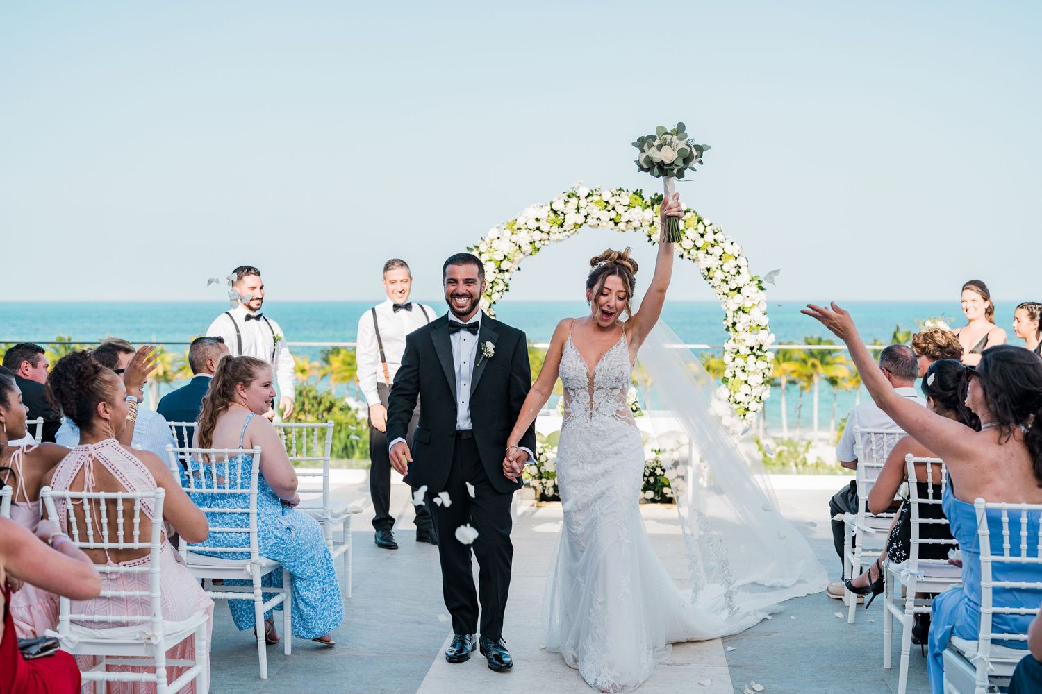 Riu Palace costa mujeres wedding - Bride and groom ceremony exit walk