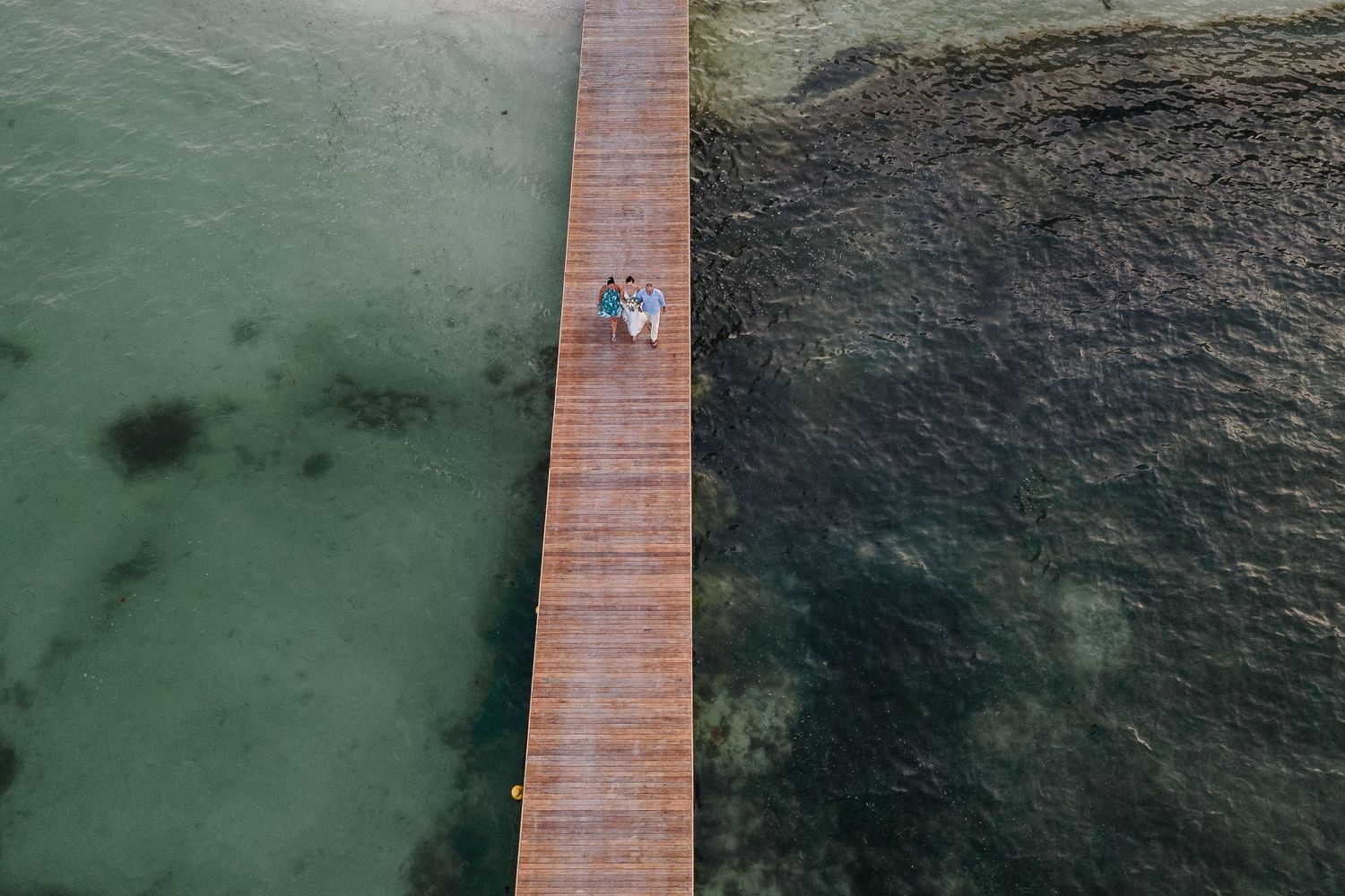Dreams Vista Cancun Resort & Spa ceremony - bride walking to aisle drone picture