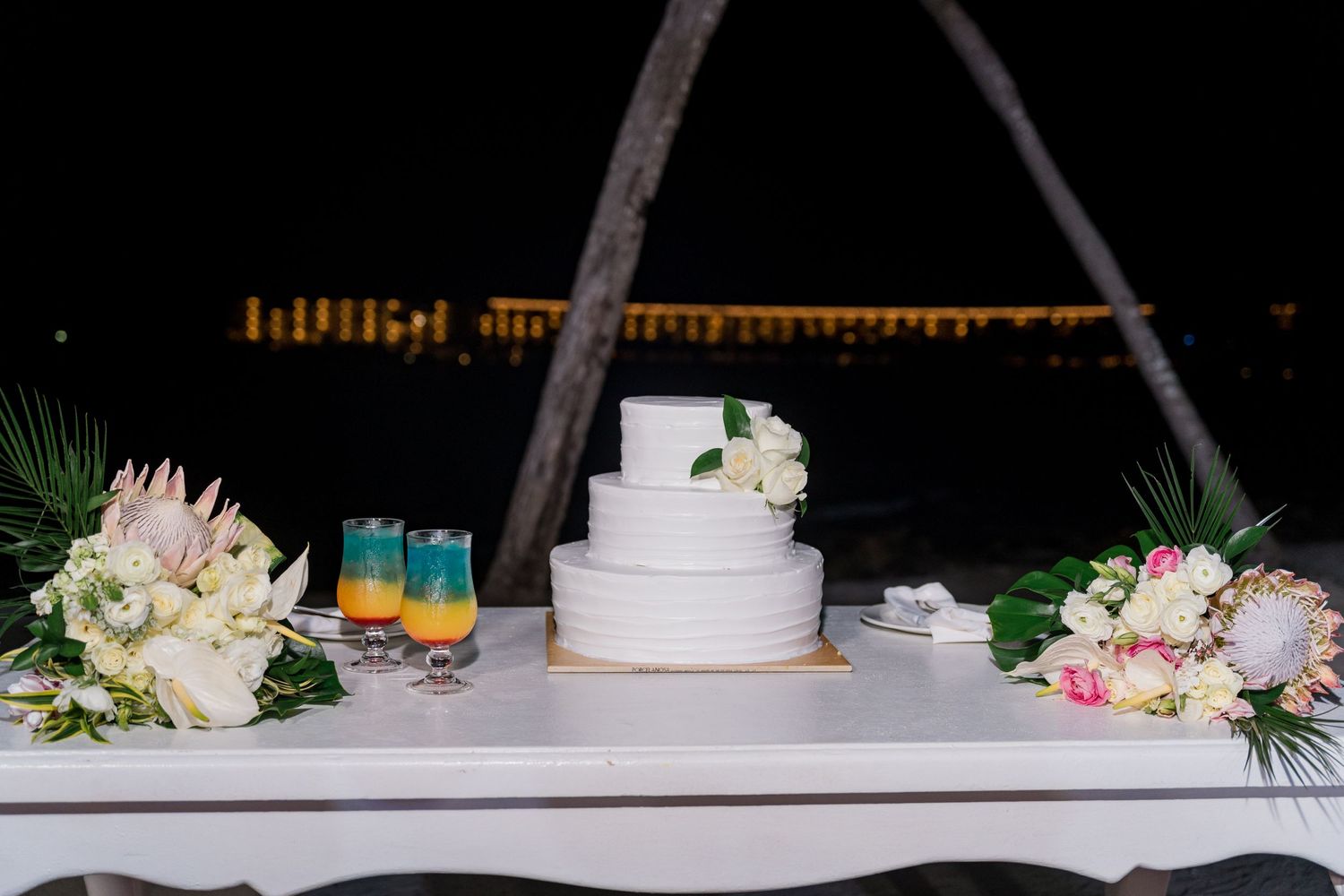 Barceló Maya Palace wedding reception cake cutting